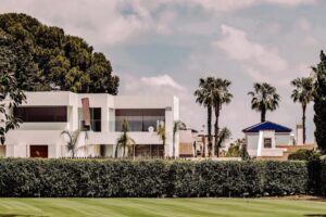 Mediterranean style villa with palm trees